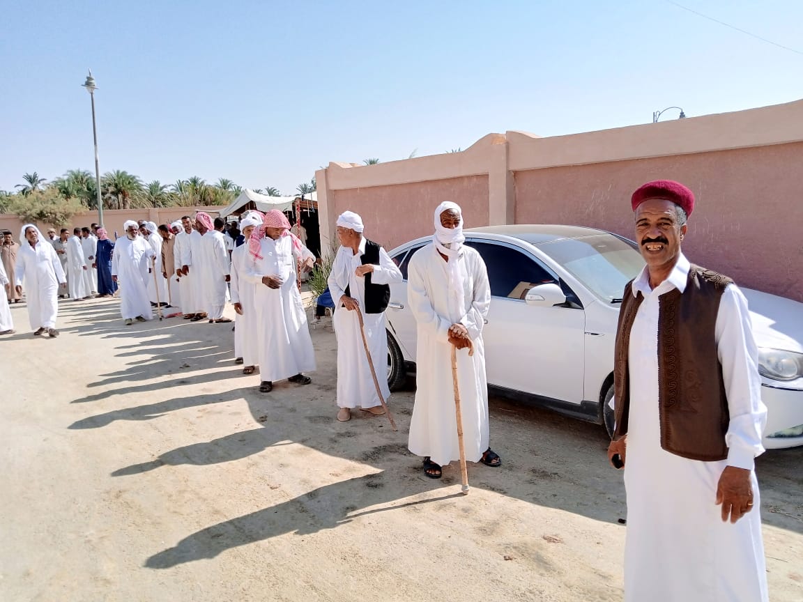 Locals line up outside a polling station in Siwa Oasis, Matrouh in the Wester Desert.