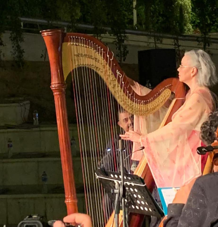 Manal Mohieldin playing the harp instrument - Min. of Tourism & Antiquities