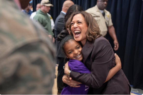 Harris embracing a young supporter - The White House