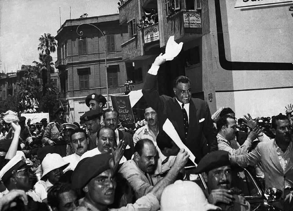 Egyptian president Gamal Abdel Nasser returns to cheering crowds in Cairo after announcing the nationalization of the Suez Canal Company, August 1956
