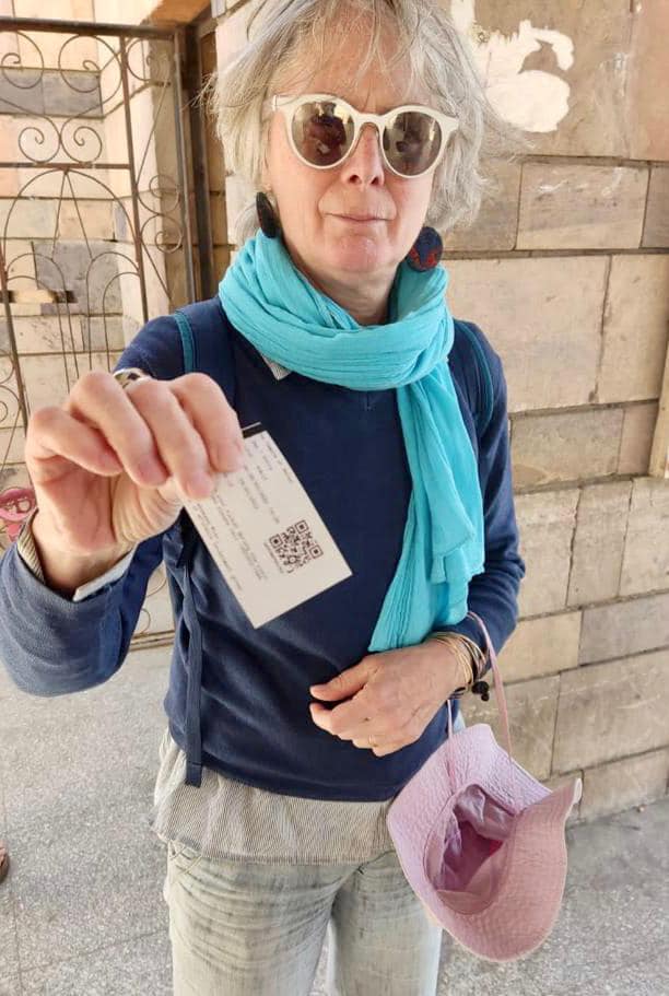 Tourist holding her electronic ticket - Min. of Tourism & Antiquities