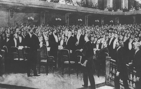 THEODOR_HERZL_AT_THE_FIRST_ZIONIST_CONGRESS_IN_BASEL