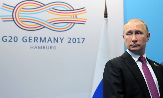 Russian President Vladimir Putin looks on before a meeting with Turkish President Recep Tayyip Erdogan at the G-20 summit in Hamburg, Germany July 8, 2017. Sputnik/Mikhail Klimentyev/Kremlin via REUTERS ATTENTION EDITORS 