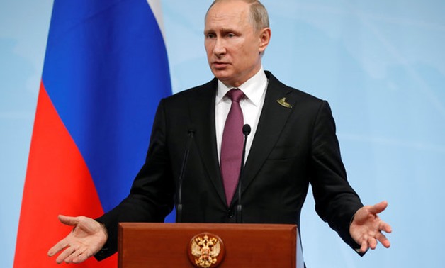 Russian President Vladimir Putin speaks during a news conference after the G20 summit in Hamburg, northern Germany, July 8, 2017. REUTERS/Alexander Zemlianichenko/POOL