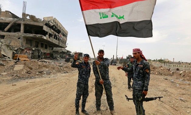 Iraqi Federal Police celebrate in the Old City of Mosul, Iraq July 8, 2017. REUTERS/Ahmed Saad