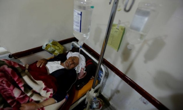 A man lies on the bed of a cholera treatment center in Sanaa, Yemen May 15, 2017. Picture taken May 15, 2017. REUTERS/Khaled Abdullah
