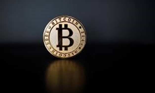 A Bitcoin (virtual currency) coin is seen in an illustration picture taken at La Maison du Bitcoin in Paris, France, June 23, 2017.
