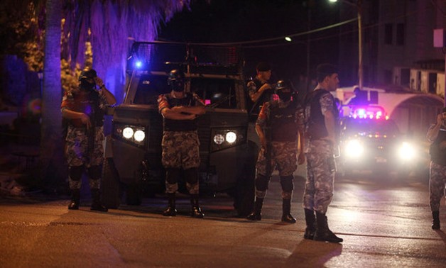 Policemen are seen near the Israeli embassy in Amman, Jordan July 23, 2017. REUTERS/ Stringer NO RESALES. NO ARCHIVES TPX IMAGES OF THE DAY

