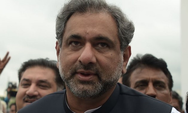 © Aamir Qureshi, AFP | Shahid Abbasi arrives at Parliament House in Islamabad on August 1, 2017.
