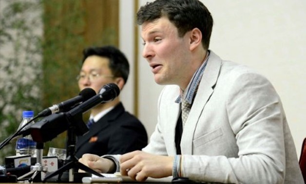 © KCNA/AFP/File | The death of US student Otto Warmbier (R) -- shown in a photo released by North Korea's official Korean Central News Agency (KCNA) on March 1, 2016 -- in part sparked the US travel ban
