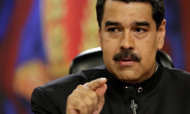 Venezuela's President Nicolas Maduro talks to the media during a news conference at Miraflores Palace in Caracas.
Marco Bello