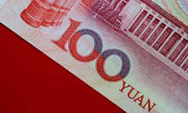 FILE PHOTO: A China yuan note is seen in this illustration photo May 31, 2017.
Thomas White/Illustration/File Photo