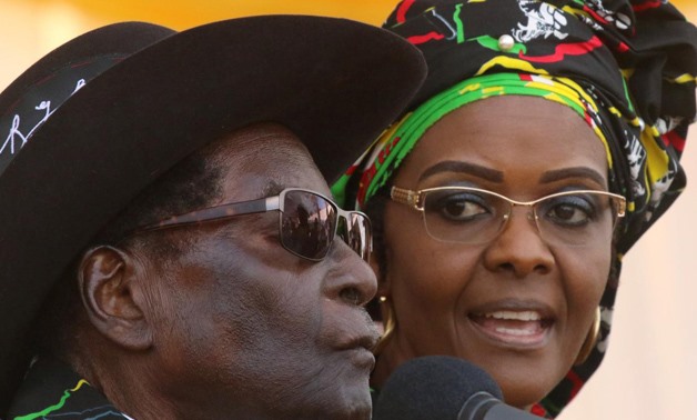 FILE PHOTO: President Robert Mugabe and his wife Grace attend a rally of his ruling ZANU (PF) in Chinhoyi, Zimbabwe July 29, 2017.
Philimon Bulawayo/File Photo