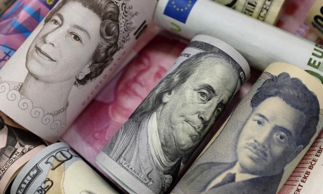 Bank notes of Euro, Hong Kong dollar, U.S. dollar, Japanese yen, GB pound and Chinese yuan are seen in this picture illustration, January 21, 2016.