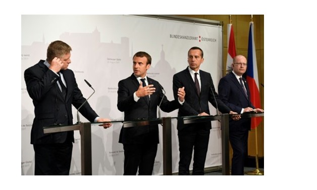 AFP / by Laurence BENHAMOU with Nina LAMPARSKI in Vienna | (L-R) Slovak Prime Minister Robert Fico, French President Emmanuel Macron, Austrian Chancellor Christian Kern and Czech Prime Minister Bohuslav Sobotka address a press conference in Salzburg