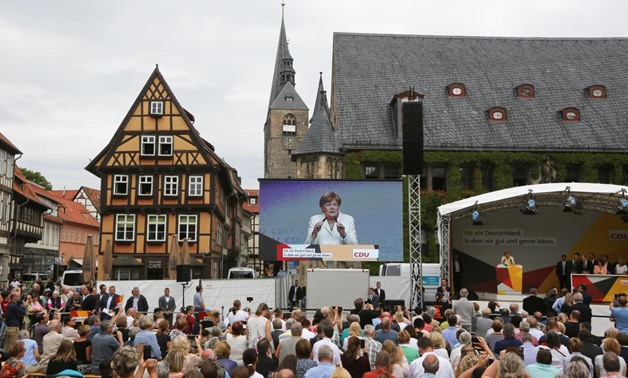 German Chancellor Angela Merkel a top candidate for the upcoming general elections of the Christian Democratic Union party (CDU) gives a speech during an election campaign rally in Quedlinburg, Germany, August 26, 2017.
Reinhard Krause