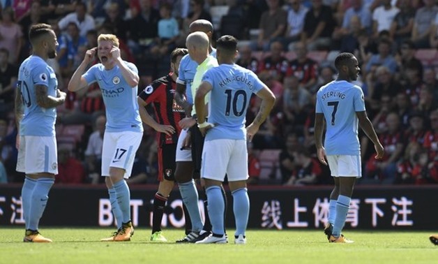 Raheem Sterling leaving the pitch after sending off – Press image courtesy Reuters