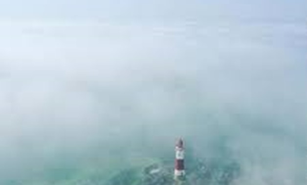 Beachy Head Lighhouse is surrounded by mist near Eastbourne, Britain August 27, 2017 in this picture obtained from Social Media. Mandatory credit: Louisa Neale via REUTERS
