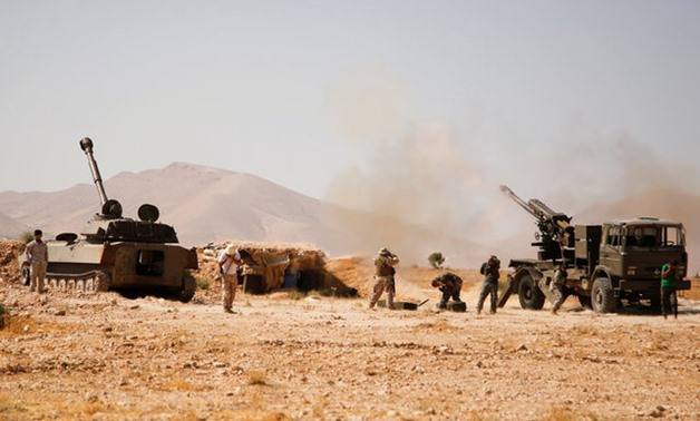 A convoy of Islamic State fighters and their families begin to depart from the Lebanon-Syria border zone in Qalamoun - REUTERS