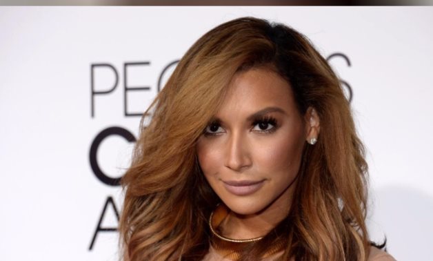  FILE PHOTO: Actress Naya Rivera, from the Fox series "Glee," arrives at the 2014 People's Choice Awards in Los Angeles, California January 8, 2014. REUTERS/Kevork Djansezian