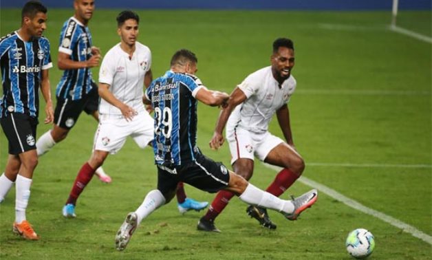 Gremio's Diego Souza scores their first goal, following the resumption of play behind closed doors after the outbreak of the coronavirus disease (COVID-19) REUTERS/Diego Vara