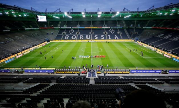 General view as the players from both teams and officials line up on the pitch REUTERS/Wolfgang Rattay/File Photo