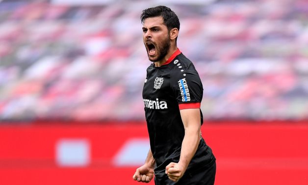 Bayer Leverkusen's Kevin Volland celebrates scoring their first goal, f Martin Meissner/Pool via REUTERS