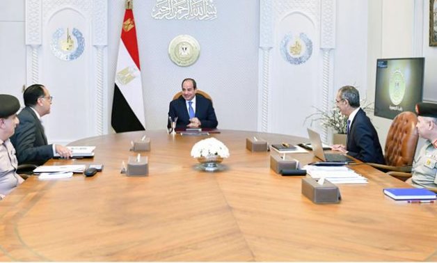 President Sisi meets with Prime Minister Moustafa Madbouly and a number of ministers- press photo