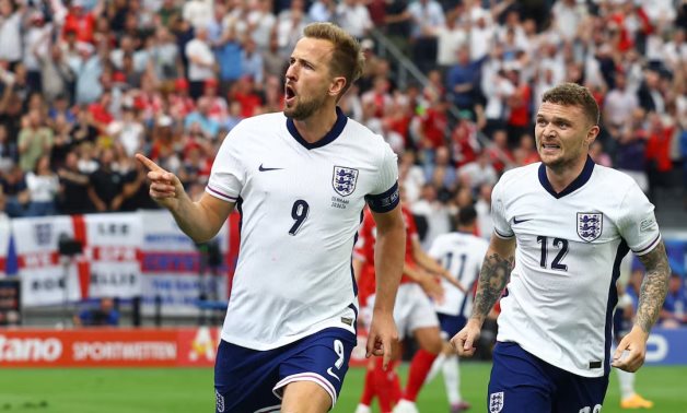 England's Harry Kane celebrates scoring their first goal with Kieran Trippier REUTERS/Lee Smith