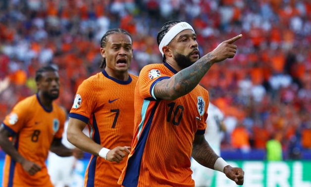 Netherlands' Memphis Depay celebrates scoring their second goal REUTERS/Lisi Niesner