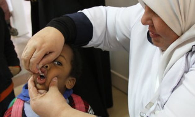 Giza, Egypt: A young boy received a polio vaccine during the 2015 polio vaccination campaign implemented by the Ministry of Health- CC via Flickr/ USAID Egypt