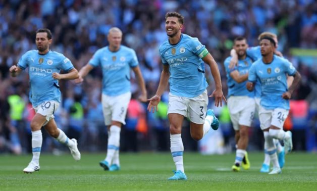 Manchester City's Ruben Dias celebrates after winning the Community Shield REUTERS/Toby Melville 