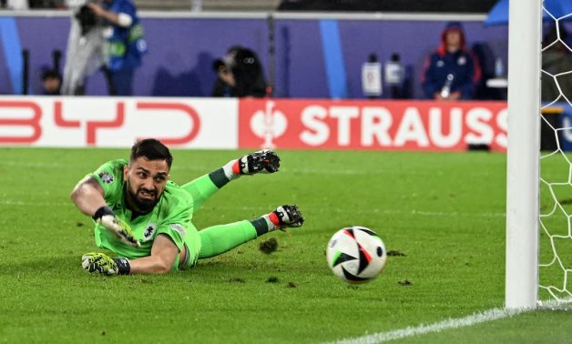 Georgia's Giorgi Mamardashvili in action as Spain's Rodri scores their first goal REUTERS/Carmen Jaspersen/File Photo