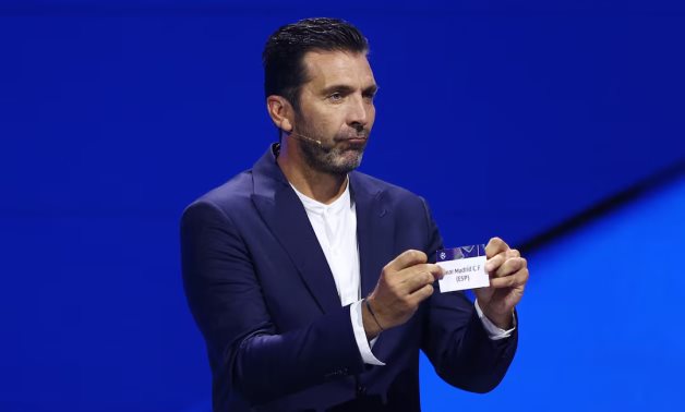 Gianluigi Buffon draws Real Madrid during the draw REUTERS/Manon Cruz