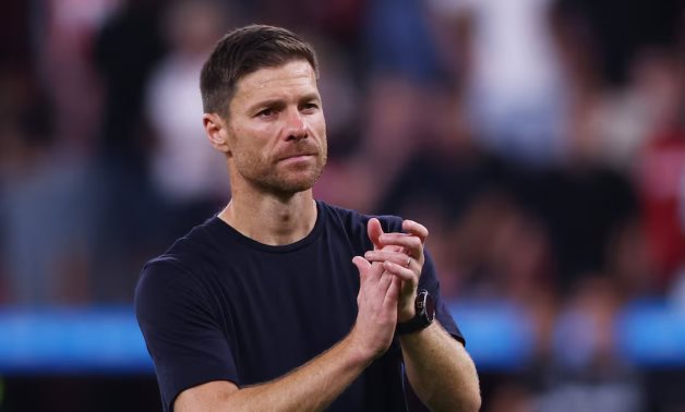 Bayer Leverkusen coach Xabi Alonso applauds fans after the match REUTERS/Thilo Schmuelgen/File Photo