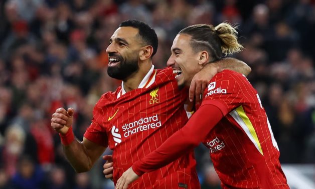 Liverpool's Mohamed Salah celebrates scoring their second goal with Kostas Tsimikas Action Images via Reuters/Lee Smith