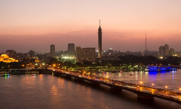 Late evening in Cairo: view of the Qasr al-Nil Bridge and the Cairo Tower at sunset – Wikimedia Commons/Frank Schulenburg