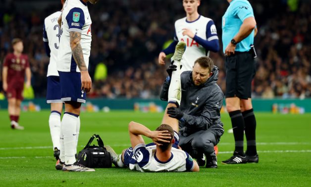 Tottenham Hotspur's Micky van de Ven receives medical attention after sustaining an injury Action Images via Reuters/Matthew Childs