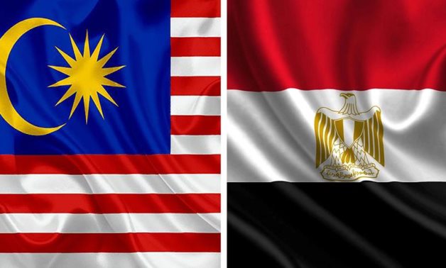 The Egyptian (R) and Malaysian (L) flags- photo from the Egyptian Presidency 