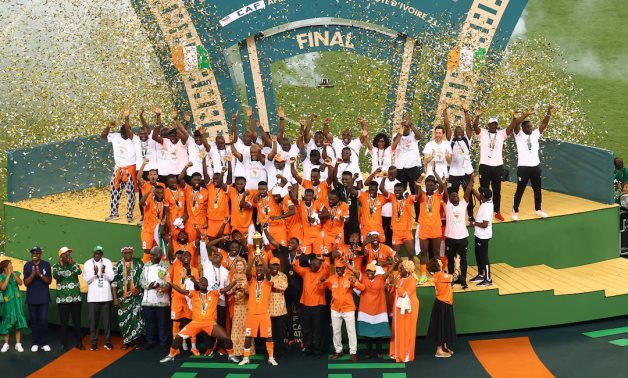 Ivory Coast's Max Gradel lifts the trophy as he celebrates with teammates after winning the Africa Cup of Nations REUTERS/Siphiwe Sibeko/File Photo