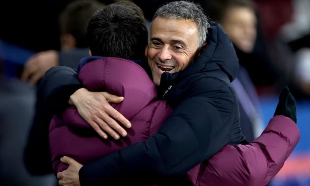 Paris St Germain coach Luis Enrique celebrates after the match REUTERS/Abdul Saboor 