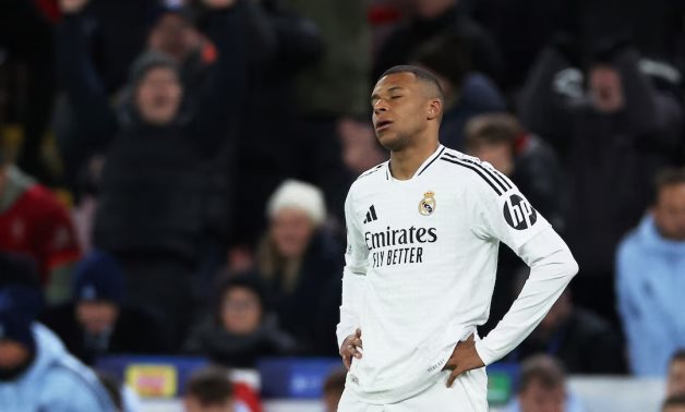 Real Madrid's Kylian Mbappe looks dejected after the match Action Images via Reuters/Lee Smith