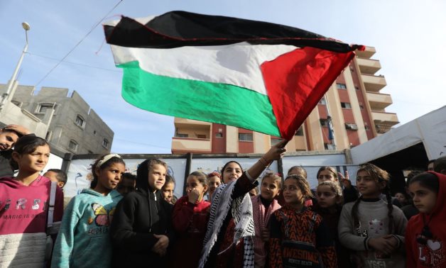 Children in Gaza celebrate as the ceasefire in Gaza takes effect on Sunday, 19 January