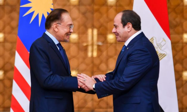 FILE - Egypt's President Abdel Fattah El Sisi receives Malaysian PM Anwar Ibrahim in Cairo, November 2024 - Egyptian Presidency