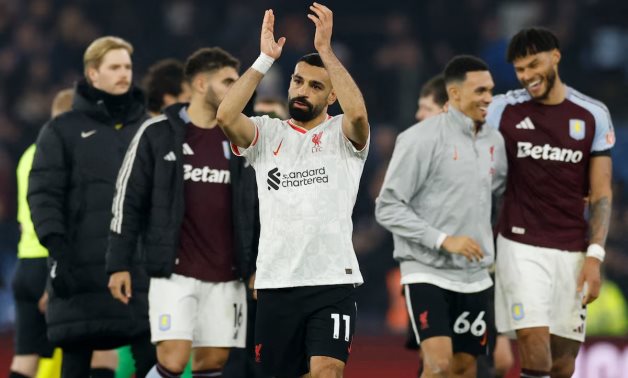 Liverpool's Mohamed Salah applauds fans after the match Action Images via Reuters/Peter Cziborra