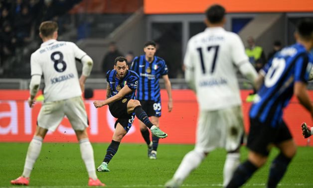 Inter Milan's Hakan Calhanoglu scores their first goal REUTERS/Daniele Mascolo/File Photo 