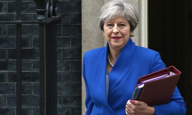 FILE PHOTO: Britain's Prime Minister Theresa May leaves Downing Street in London, Britain July 19, 2017. REUTERS/Neil Hall