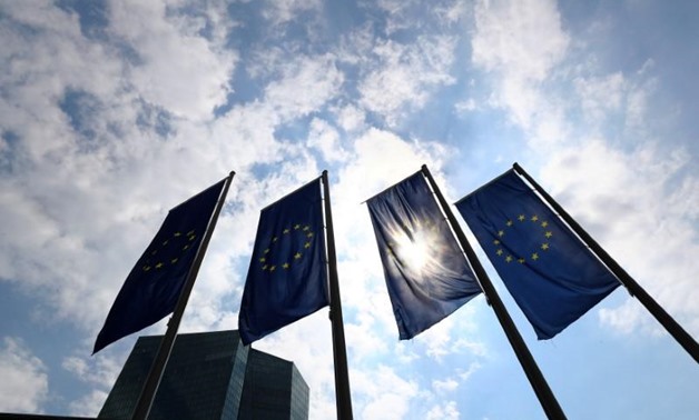 Flags in front of the European Central Bank (ECB) before a news conference at the ECB headquarters in Frankfurt, Germany, April 27, 2017. REUTERS/Kai Pfaffenbach