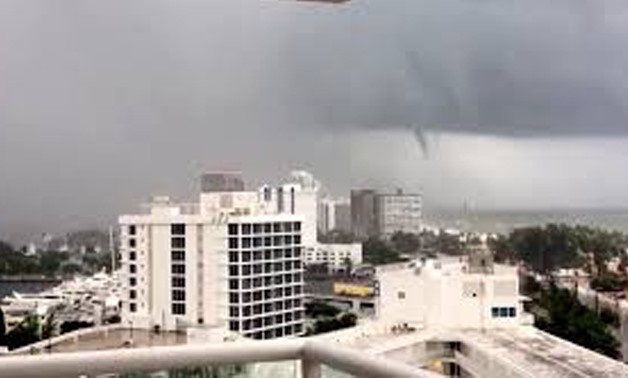 A tornado is seen from Fort Lauderdale beach, Florida, U.S., September 9, 2017, in this still image taken from a video obtained from social media. Twitter/Karina Bauza/via REUTERS