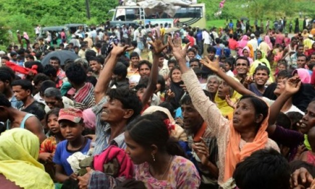  AFP/File | Newly arrived Rohingya refugees scuffle for relief supplies at Kutupalong refugee camp in Bangladesh. Nearly 300,000 Rohingya have fled violence churning through Myanmar's Rakhine state